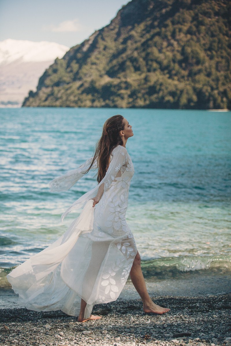 Wedding editorial with bride wearing Rue De Seine Zeppelin wedding gown at lake side wedding in Queenstown New Zealand