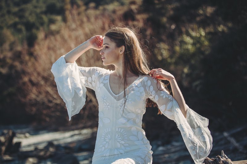 Wedding editorial with bride wearing Rue De Seine Zeppelin wedding gown at lake side wedding in Queenstown New Zealand