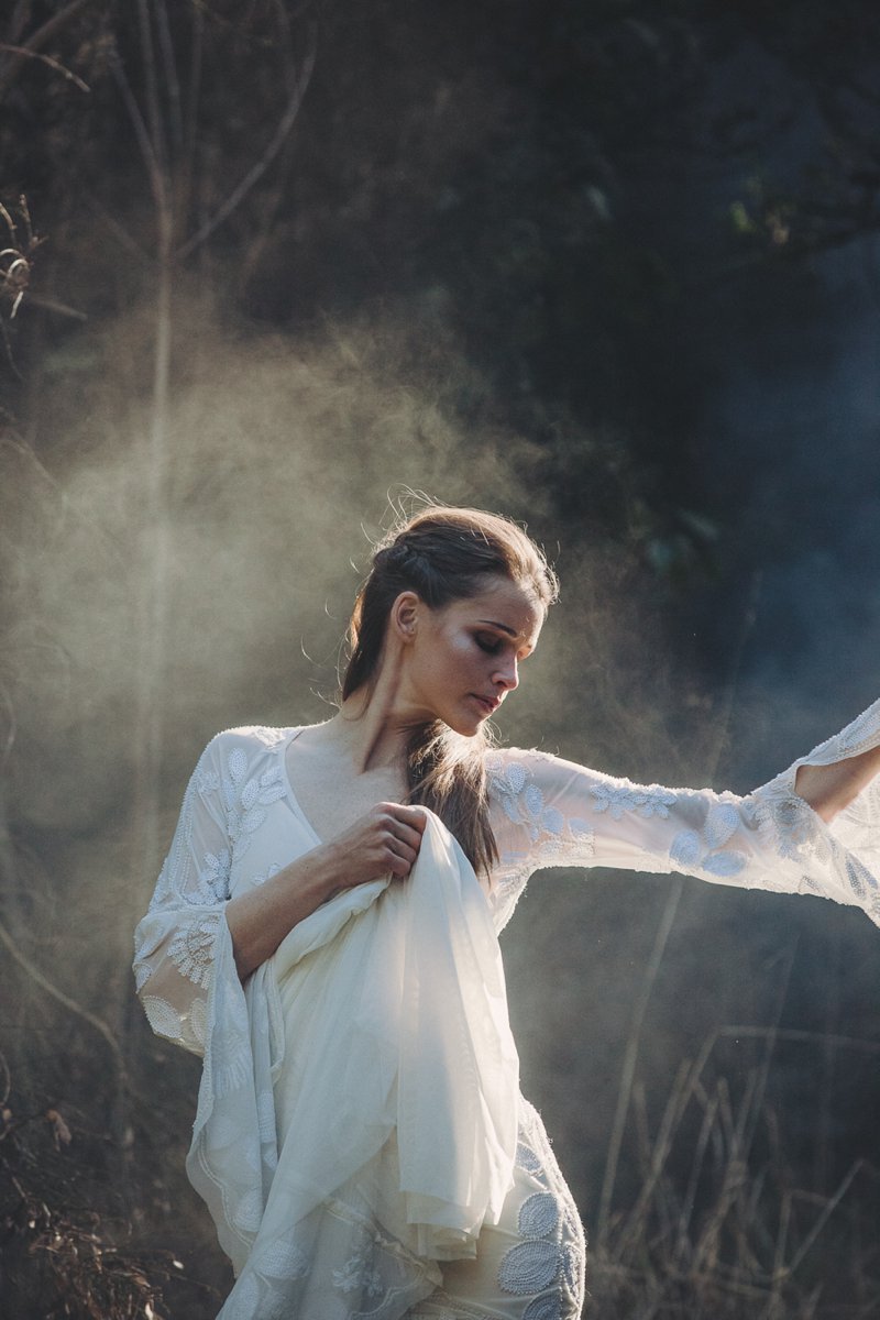Wedding editorial with bride wearing Rue De Seine Zeppelin wedding gown at lake side wedding in Queenstown New Zealand